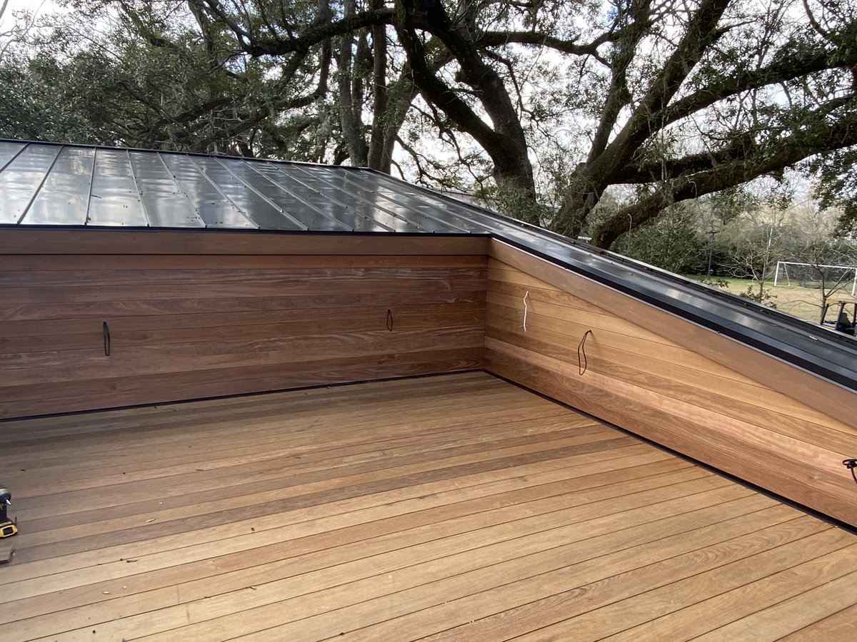 Custom cedar deck and standing seam metal roof detail